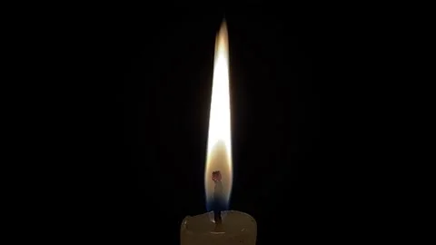 Burning candle on a dark background.Romantic evening. Video stock 172541524
