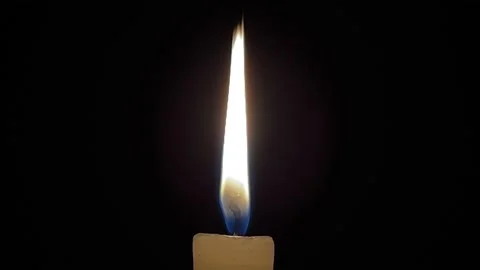 Burning candle on a dark background.Romantic evening. Stock-Footage 188266277