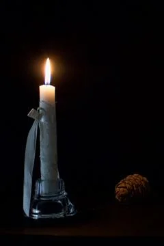 Burning candle  in the dark on Easter eve Foto stock