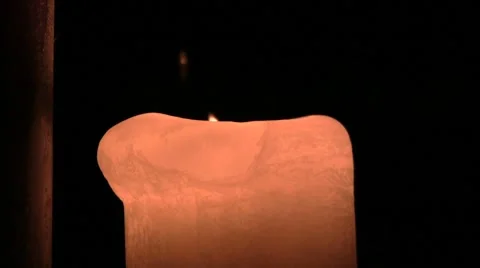 Burning candle in the dark Stock Footage 8678692