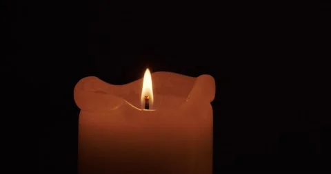 Burning candle in the dark Stock Footage 227042237