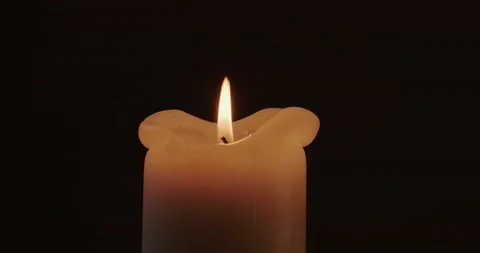 Burning candle in the dark Stock Footage 227042671