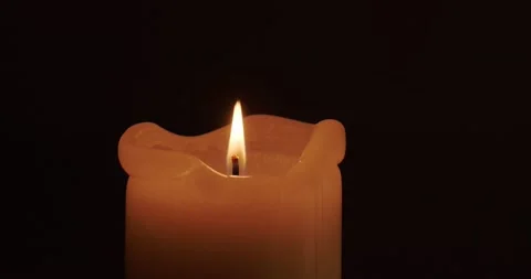 Burning candle in the dark Stock Footage 227042805