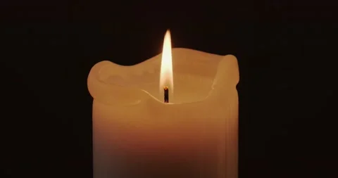Burning candle in the dark Stock Footage 227043026