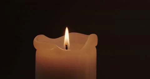 Burning candle in the dark Stock Footage 227043209