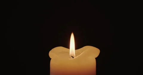 Burning candle in the dark Stock Footage 227043371