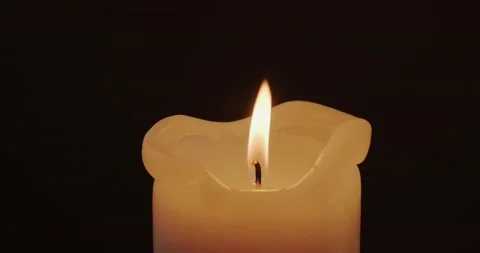 Burning candle in the dark Stock Footage 227043427