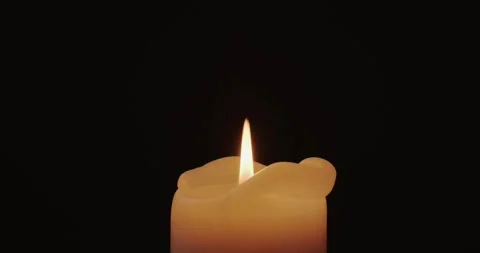 Burning candle in the dark Stock Footage 227043438