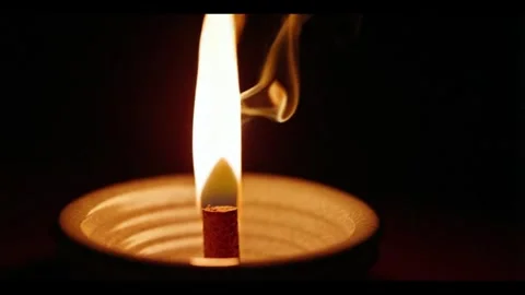 Burning candle in the dark Stock Footage 292906639