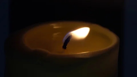 Burning candle fire, closeup, loopable Stock Footage 98762230