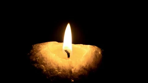 Burning Candle Flame Close Up Loop Melting Wax Black Background 動画素材 340298212