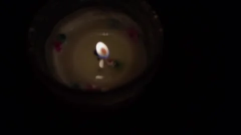 Burning candle flame in dark background Stock Footage 318171767