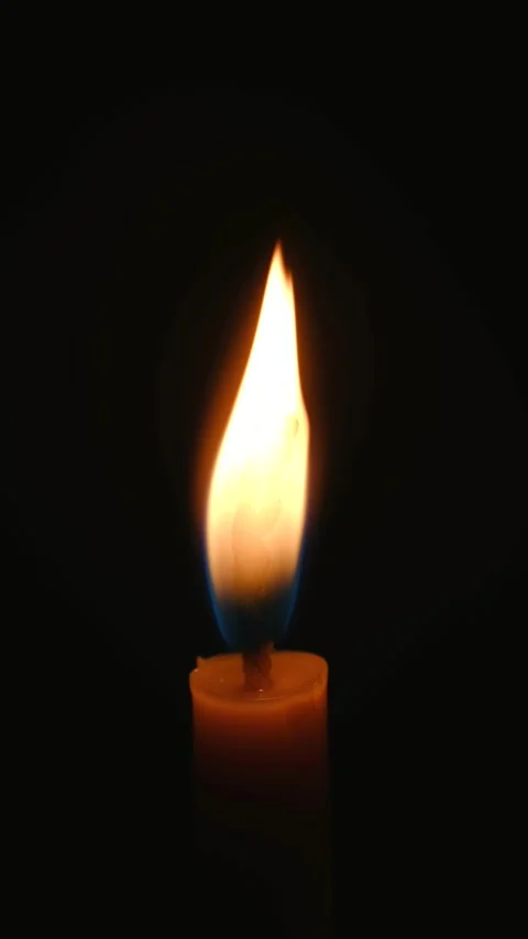 Burning candle flame flickering in darkness Stock-Footage 312982281