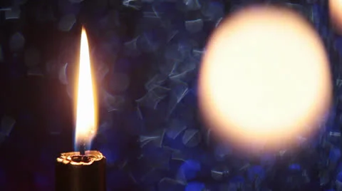 Burning candle light, dancing light spot at night Video stock 23682967