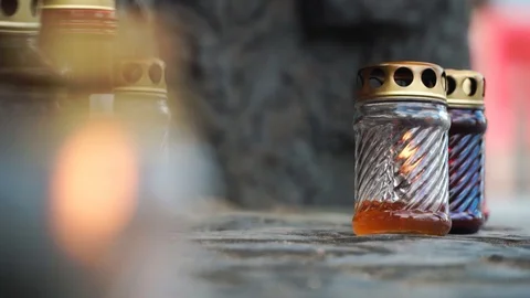 Burning candle at the monument Stock Footage 102772227