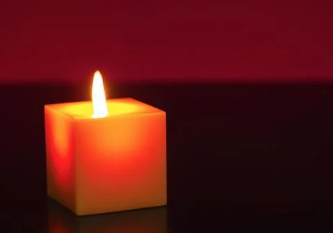 A burning candle Stock Photos