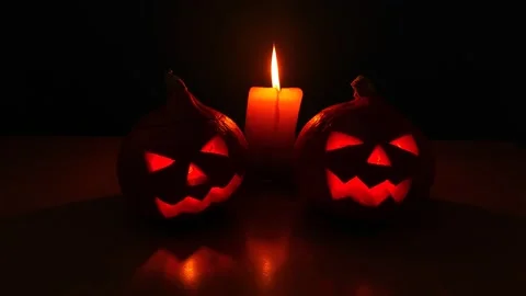Burning candle with pumpkin head-lantern for Halloween Stock-Footage 141387007