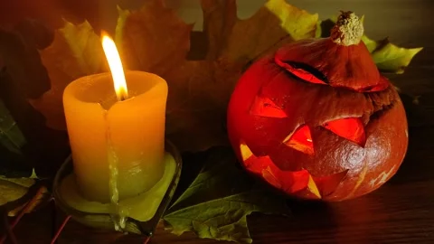 Burning candle with pumpkin head-lantern for Halloween Stock-Footage 141387286