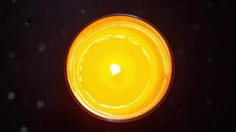 Burning candle. View from above. slow motion video Stock Footage 169504301