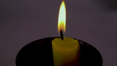 Burning a candle on a white background 库存影片 111375623