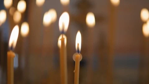 Burning candles on the altar Stock Footage 74899634