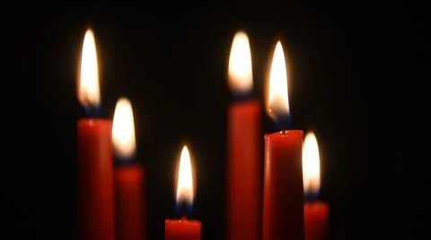 Burning candles, black background Stock Footage 48483981