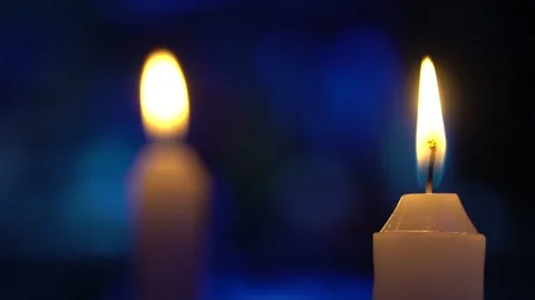 Burning candles with blurred blue background Stock Footage 274366275