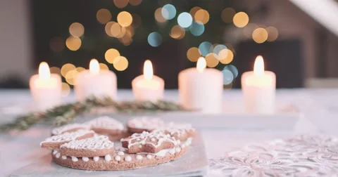 Burning Candles by the Blurred Christmas Lights. 4K DCi SLOW MOTION 120 fps. Stock Footage 67219800