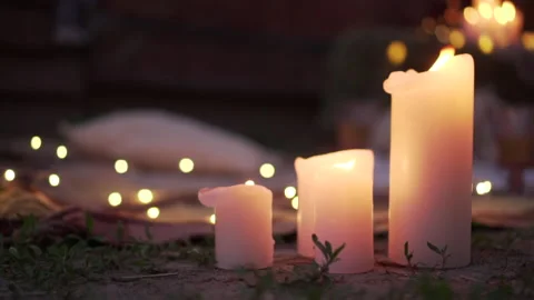 Burning candles on a bokeh background. Video stock 131403445