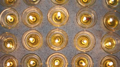 Burning candles at a Buddhist temple Video stock 52323832