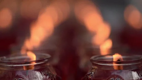 Burning candles in a Buddhist temple Stock Footage 84988331