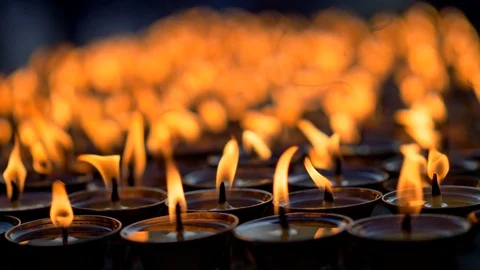 Burning candles at a Buddhist temple Video stock 93867382