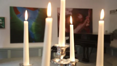 Burning candles in a candlestick. Video stock 138315781