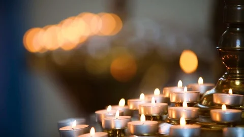 Burning candles, colourfull slow motion Stock Footage 95636816