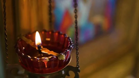 Burning candles, colourfull slow motion Stock Footage 95725589