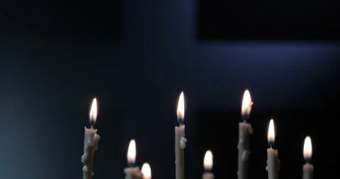 Burning a candles on dark background Stock Footage 143126806