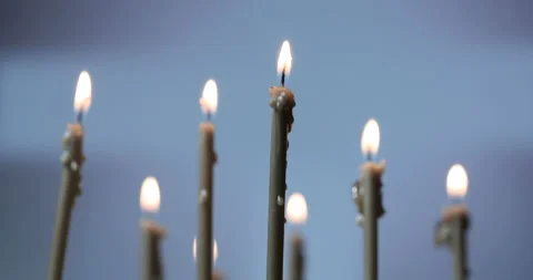 Burning a candles on dark background Stock Footage 143126937