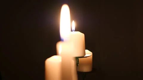 Burning candles in the dark. Close-up. Stock Footage 150643674