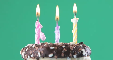 Burning candles on a donut Stock Footage 234967120