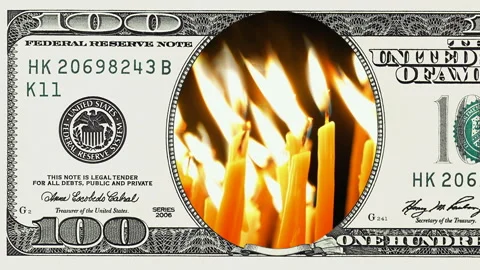 Burning candles in frame of 100 dollar bill Stock Footage 97601454