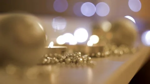 Burning candles in gold tones, blurred background, colorful lilac bokeh. Stock Footage 162271953