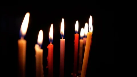 Burning candles in hanukkiah Stock Footage 99043968