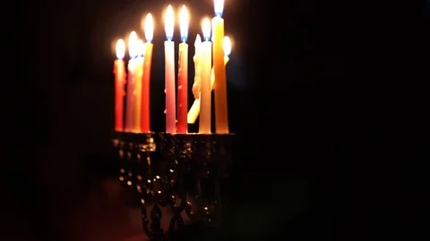 Burning candles in hanukkiah Stock Footage 99044006