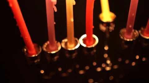 Burning candles in hanukkiah Stock Footage 99045580