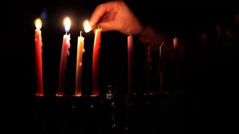 Burning candles in hanukkiah Stock Footage 99045907
