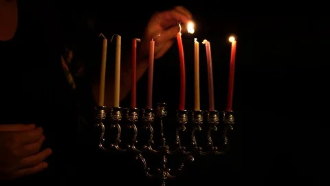 Burning candles in hanukkiah Stock Footage 99053289