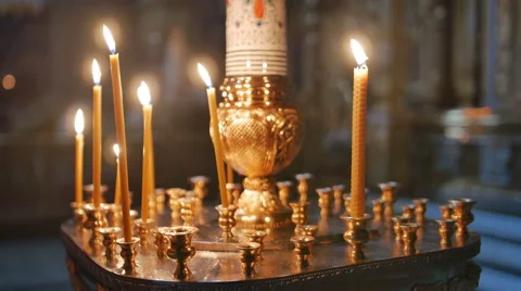 Burning candles inside a church Stock Footage 58491427