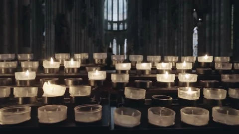 Burning candles inside the Cologne dom cathedral, slow motion 스톡 동영상 219348147