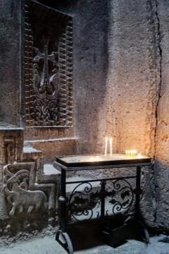 Burning candles in the monastery. Stock Photos