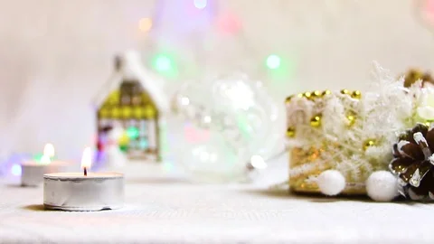 Burning candles, New Year's attributes and flashing flashlights Video stock 82407446